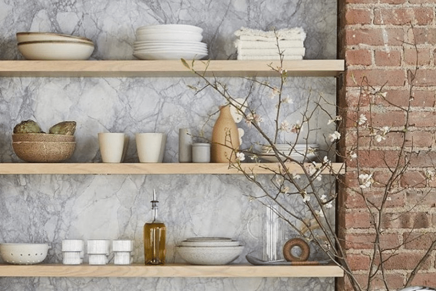 red brick backsplash with white marble