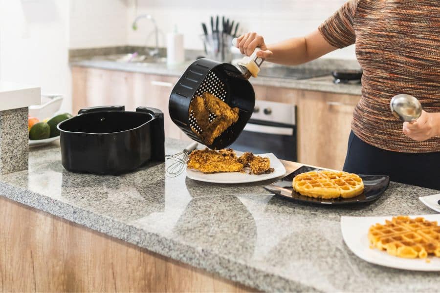 https://uniquedesignblog.com/wp-content/uploads/2023/07/can-I-put-my-air-fryer-on-a-granite-countertop-.jpg