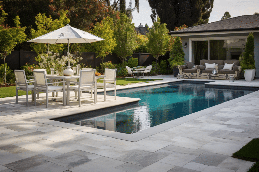 california pool with marble pavers